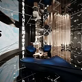 Modern Shop Front Desk Interior Design With Glass Decor And Warm Lighting