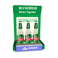 Tsingtao Beer Bottles And Beer Glasses On Green Display Shelf With Better Together