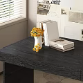 Books on Dark Wooden Desk with Yellow Flowers Vase and Wall Collage Near Window Blinds