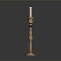 Elegant Brass Candle Holder Stand With Lit White Candle And Detailed Design
