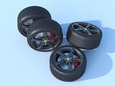 Set of Four Stylish Black Car Tires With Black Rims And Yellow Center Logos 3d model