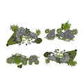 Natural Looking Rockery Stones With Green Plants And Small Trees In Garden