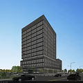 Modern High Rise Office Building With Glass Curtain Wall Surrounded By Trees Roads And Cars
