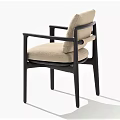 Minimalist Chair With Black Frame Beige Cushion And Backrest On White Background