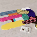 Colorful Geometric Decorative Rug on Wooden Floor with Books and Fruit Bowl