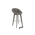 Modern Bar Stools With Green And Beige Padded Seats And Wooden Legs