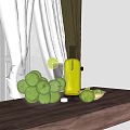 Spherical Glass Bowl With Green Limes And Transparent Wine Bottle On Wooden Table Curtain Background