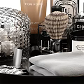 Elegant Bathroom Accessories On Black Tray With Silver Container Brush Candle Towel And Green Leaves