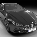 Luxury Black Maserati Sports Car With Sleek Exterior And Distinctive Grille