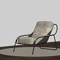 Modern Patterned Fabric Lounge Chair With Metal Frame On Round Rug And Floor Lamp