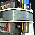 DIY Device Assembled With 12V Batteries Blue Cap Bottle Warning Label And Colored Wires