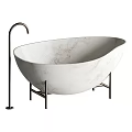 Elegant Freestanding Marble Bathtub with Metal Stand and Modern Faucet Design