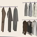 Various Clothing Items Hanging on Wall Near Window with Blinds Including Coats Sweaters and Vests