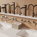 Modern Kitchen Faucets Sinks And Towel Holders On Countertop