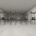 Art Installation With Metal Stands And Monitors Displaying Black And White Images In White Room