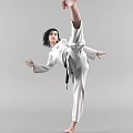Woman In White Taekwondo Uniform Performing High Kick With Black Belt