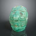 Green Jade Mask Sculpture Carving With Intricate Facial And Decorative Details