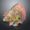 Natural Rock Formation With Vibrant Pink Green Yellow Hues And Textured Surface