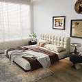 Modern Beige Double Bed with Tufted Headboard Blankets Pillows Nightstands Vase Flowers and Table Lamp
