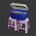 Open Blue Cooler With White Lid On Two White Plastic Stools Containing Colorful Ice