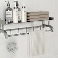 Bathroom Wall Mounted Shelf With Toiletries Stacked Towels And Hanging Loofah