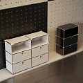 White and Black Chest of Drawers With Multiple Drawers Open Compartments and Polka Dot Walls