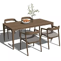 Modern Dining Table Set with Wooden Table Four Chairs Orange Bowl and Green Plant