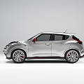 Silver Compact Sports Car Featuring Sporty Design Red Accents And Alloy Wheels
