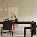 Black Dining Table With Red And Black Chairs Vase Twigs Book And Transparent Pendant Light