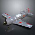 Silver Fighter Model Airplane With Red Star Symbols And Red Stripes