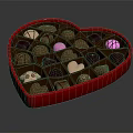 Heart Shaped Box Filled With Assorted Delicious Chocolates Of Different Shapes