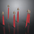 Five Bells With Red Tassels As Household Items On Black Background