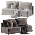 Comfortable Two Seater Sofa With Soft Decorative Pillows And Cozy Blanket