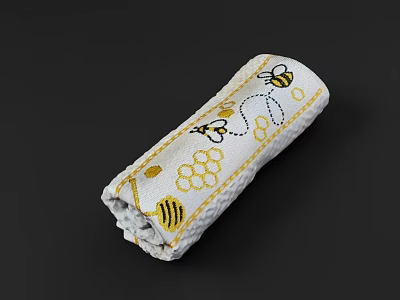 Decorative White Towel With Cute Bee And Honeycomb Pattern Rolled Neatly 3d model