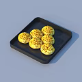 Black Tray With Six Yellow Spotted Round Pastries For Daily Use