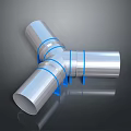 T Shaped Silver Colored Metal Pipe Fitting With Blue Rings On Black Reflective Surface