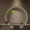 Chinese Style Tea Set Teapot Cups on Tabletop with Circular Arch and Green Plant
