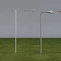Various Designed Outdoor Lights With Silver White Brown Poles Standing On Green Grass
