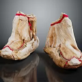 Two Detailed Foot Shaped Carved Sculptures With Red Decorative Lines Design