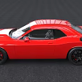 Red Muscle Car With Sleek Exterior Design And Black Alloy Wheels