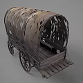 Vintage Covered Wagon With Tattered Canvas Top And Wooden Wheels