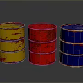 Three Colored Oil Drums Yellow Red Blue Rusty Metal Containers On Gray Background