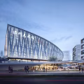 Modern Shopping Mall Building With Glass Curtain Wall Facade And Pedestrians At Dusk