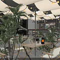 Modern Hot Pot Restaurant Interior With Green Plants Hanging Lights Seating Area And Stone Decorations