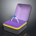 Purple Jewelry Box With Blue Gemstone Ring And Yellow Trim