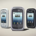 Three Samsung And LG Digital Mobile Phones Screen Showing Time 1030