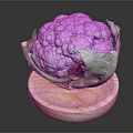 Fresh Purple Cauliflower with Green Leaves Displayed on Wooden Round Board