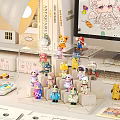 Colorful Figurines Display On Transparent Step Stand With Desktop Accessories And Computer