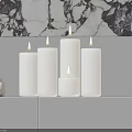 Stylish Candle Lamp Display On White Cabinet With Marble Slab Books And Box