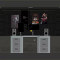 Office Desk Setup With Black Acoustic Panel Walls Posters Computer Monitors Speakers And Drawer Cabinets